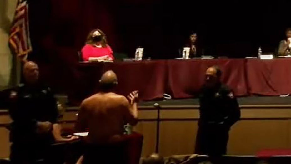 Texas man strips down to underwear over masks at heated school board meeting