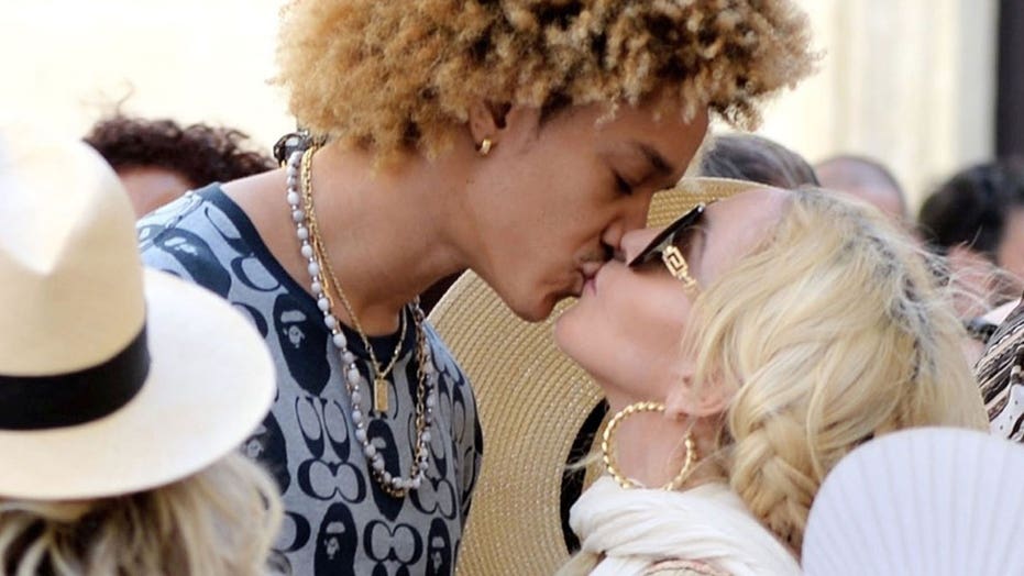 Madonna and her boyfriend Ahlamalik Williams, 27, pack on the PDA while celebrating pop star’s 63rd birthday