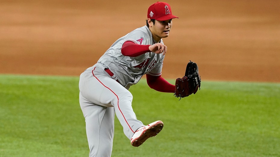 Solid Ohtani, speedy Lagares help Angels beat Rangers 2-1