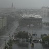 Rain batters Canal Street in New Orleans, Louisiana on August 29, 2021 after Hurricane Ida made landfall. - Ida made landfall as "an extremely dangerous" Category 4 storm in Louisiana on Sunday, according to the National Hurricane Center, 16 years to the day after Hurricane Katrina devastated the region. "Extremely dangerous Category 4 Hurricane Ida makes landfall near Port Fourchon, Louisiana," the NHC wrote in an advisory. Ida struck the port, which is located 100 miles (160 kilometers) directly south of New Orleans, at 1655 GMT, packing maximum sustained winds estimated at 150 miles per hour. (Photo by Patrick T. FALLON / AFP) (Photo by PATRICK T. FALLON/AFP via Getty Images)