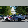 A Metropolitan Police Department cruiser blocks a street near the U.S. Capitol and a Library of Congress building in Washington on Thursday, Aug. 19, 2021, as law enforcement officials investigate a report of a pickup truck containing an explosive device. (AP Photo/Patrick Semansky)