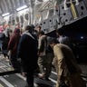 In this Aug. 22, 2021, photo provided by the U.S. Air Force, Afghan passengers board a U.S. Air Force C-17 Globemaster III during the Afghanistan evacuation at Hamid Karzai International Airport in Kabul, Afghanistan. (MSgt. Donald R. Allen/U.S. Air Force via AP)