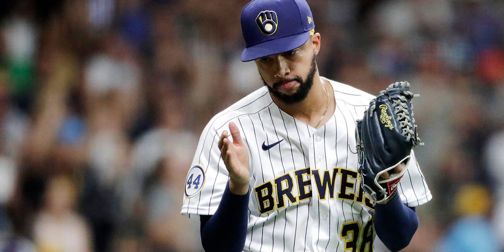 Brewers' Devin Williams breaks throwing hand after punching wall, will miss playoffs - Vimarsana News