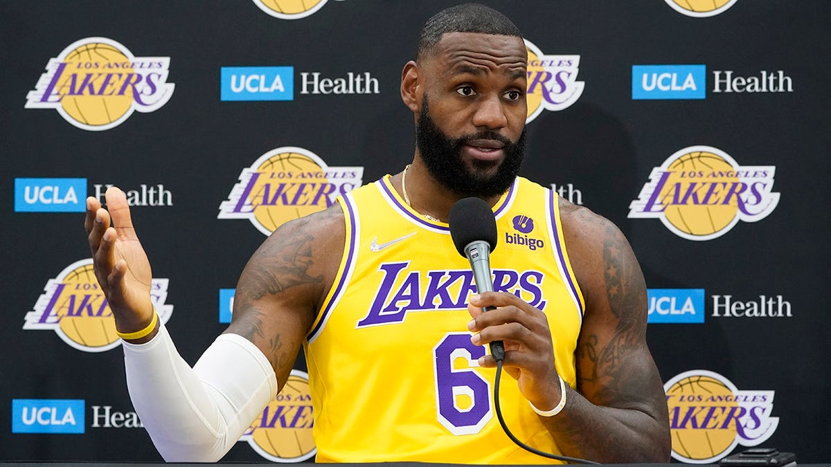 Los Angeles Lakers forward LeBron James fields questions during the NBA basketball team's Media Day Tuesday, Sept. 28, 2021, in El Segundo, California.