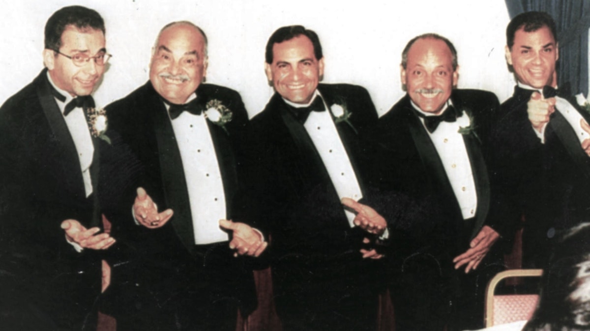 Adam Arias (right) pictured with his brothers and father (Credit: Don Arias)