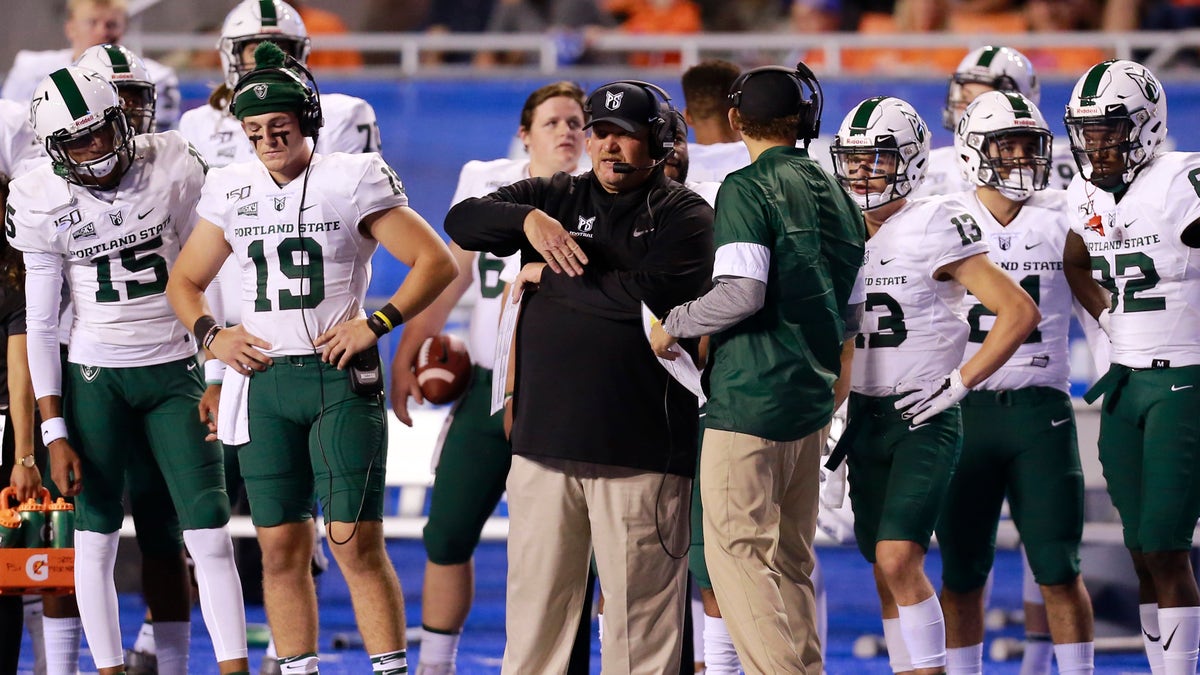 Sep 14, 2019; Boise, ID, USA; Portland State Vikings head coach Bruce Barnum (black coat)  during the second half of play against the Boise State Broncos  at Albertsons Stadium.  Boise State defeats Portland State 45-10. Mandatory Credit: Brian Losness-USA TODAY Sports