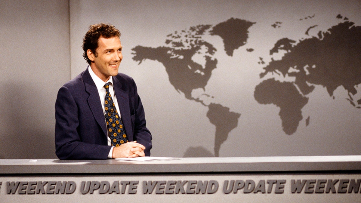 Norm Macdonald is seen during the 'Weekend Update' skit on ‘SNL’ back on April 12, 1997.?