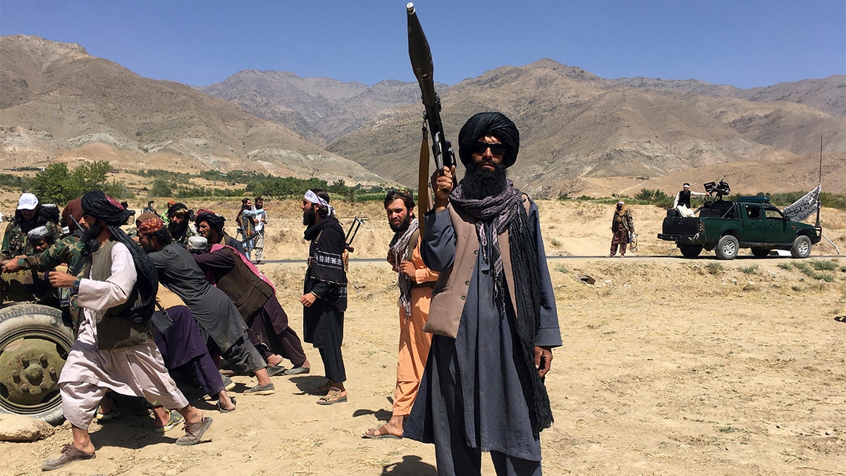Taliban soldiers stand guard in Panjshir province northeastern of Afghanistan, Wednesday, Sept. 8, 2021. 
