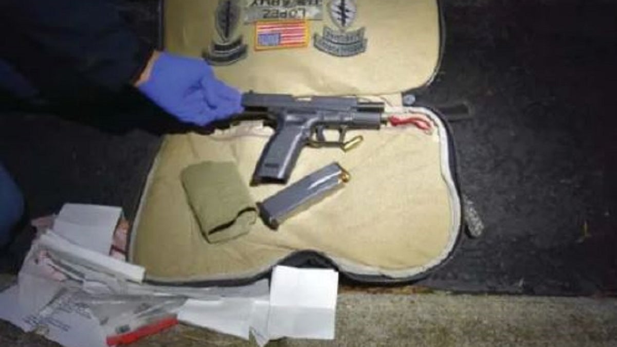 A handgun and ammunition was found in a bag belonging ot Darrin Lopez, authorities said.