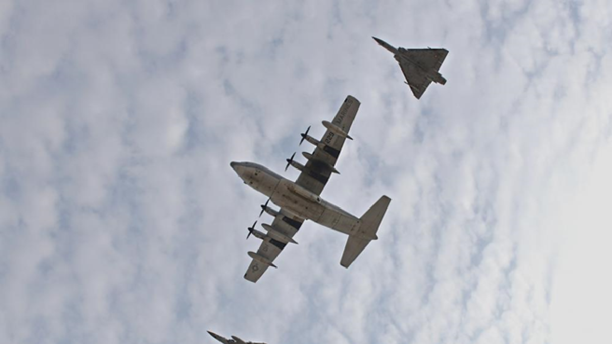 A U.S. KC-130J Super Hercules, with Combined Joint Task Force - Horn of Africa, and two French Dassault Mirage 2000’s perform a combined flyover with during a Patriot’s Day ceremony at Camp Lemonnier, Djibouti, Sept. 11, 2021, commemorating the 20th anniversary of the terrorist attacks on the United States on Sept. 11, 2001. The memorial ceremony included a joint formation, a multi-aircraft flyover, presentation of colors and the playing of Taps. Camp Lemonnier held multiple events in honor and remembrance of those who lost their lives both on that day and over the past two decades fighting the Global War on Terror. 