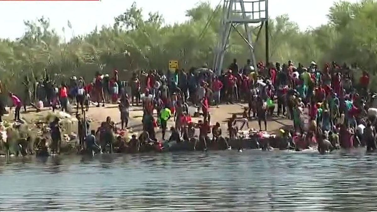 Migrants crossing the border