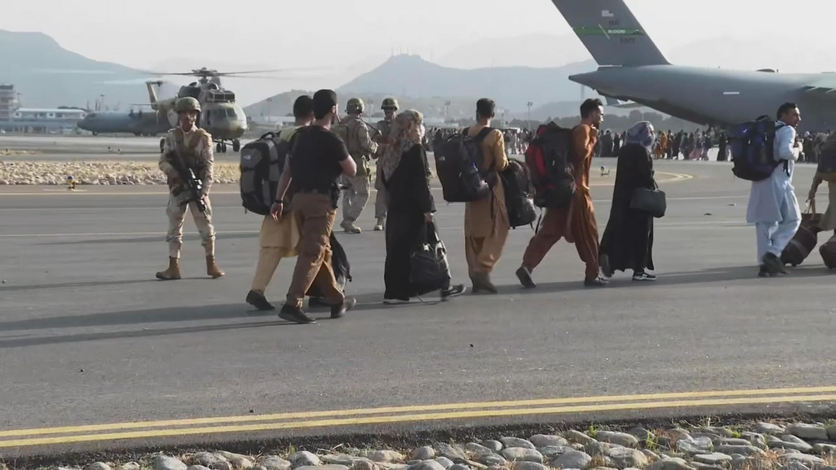 Refugees flee Afghanistan on August 22, 2021. (Fox News)
