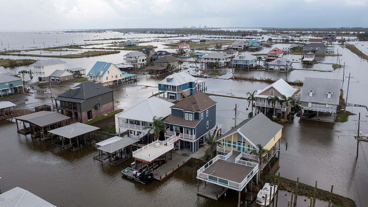 Floodwaters still surround homes as residents try to recover from the effects of Hurricane Ida Wednesday, Sept. 1, 2021, in Myrtle Grove, Louisiana. (Associated Press)