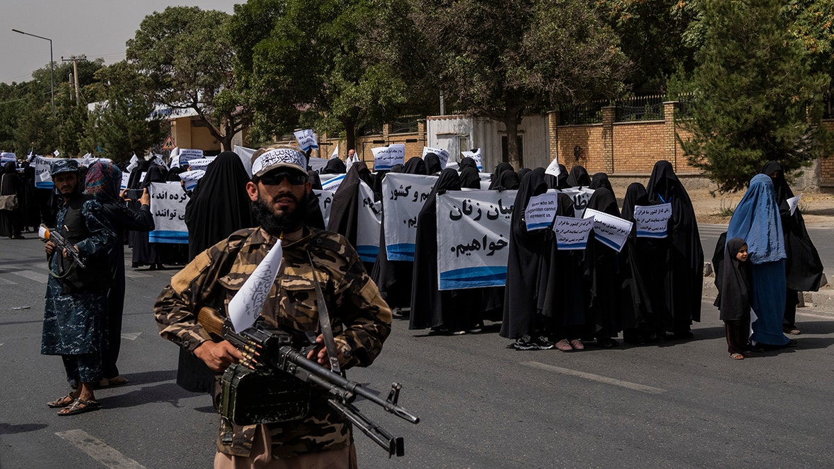 Women march in support of the Taliban government outside Kabul University, Afghanistan, on Saturday, Sept. 11, 2021.?