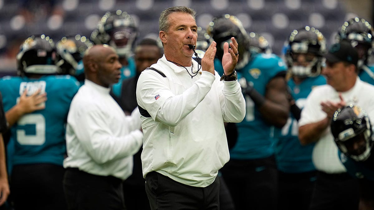 Jacksonville Jaguars coach Urban Meyer blows his whistle before an NFL football game against the Houston Texans Sunday, Sept. 12, 2021, in Houston.