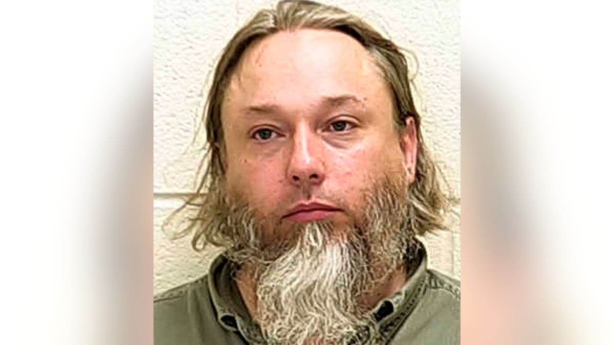 This undated file photo provided by The Ford County Sheriff's Office in Paxton, Ill., shows Michael Hari, a militia leader convicted of master­minding the bombing of a Minnesota mosque. Hari is now known by her transgender identity, Emily Claire Hari. 