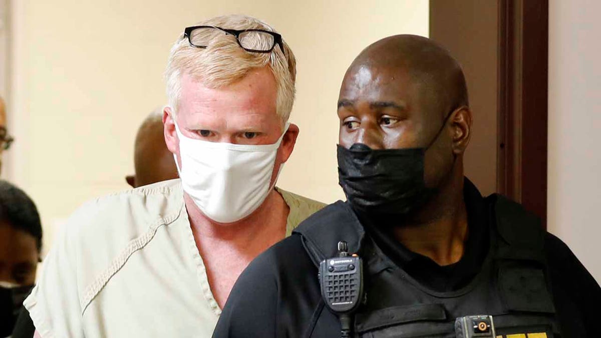 Alex Murdaugh walks into his bond hearing Thursday, Sept. 16, 2021, in Varnville, S.C. Murdaugh surrendered to face insurance fraud and other charges after state police said he arranged to have himself shot in the head so that his son would get a $10 million life insurance payout.