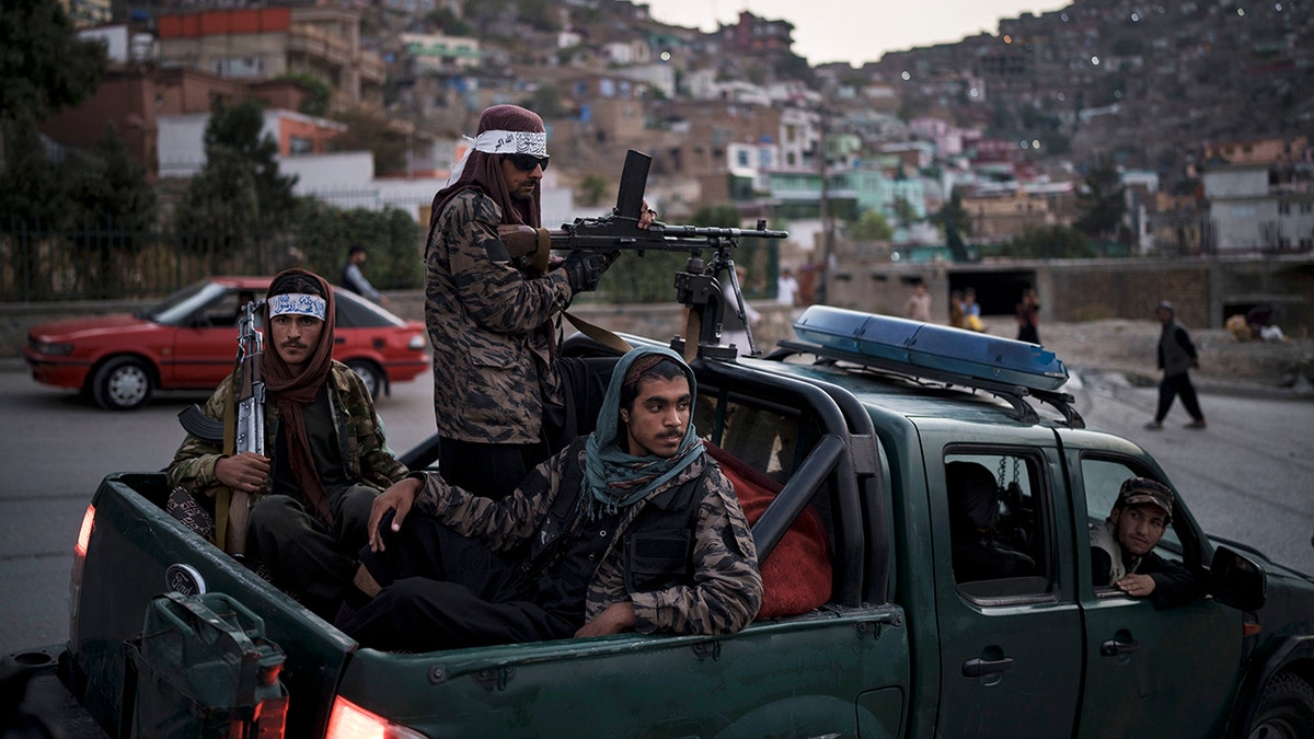 Taliban fighters in truck