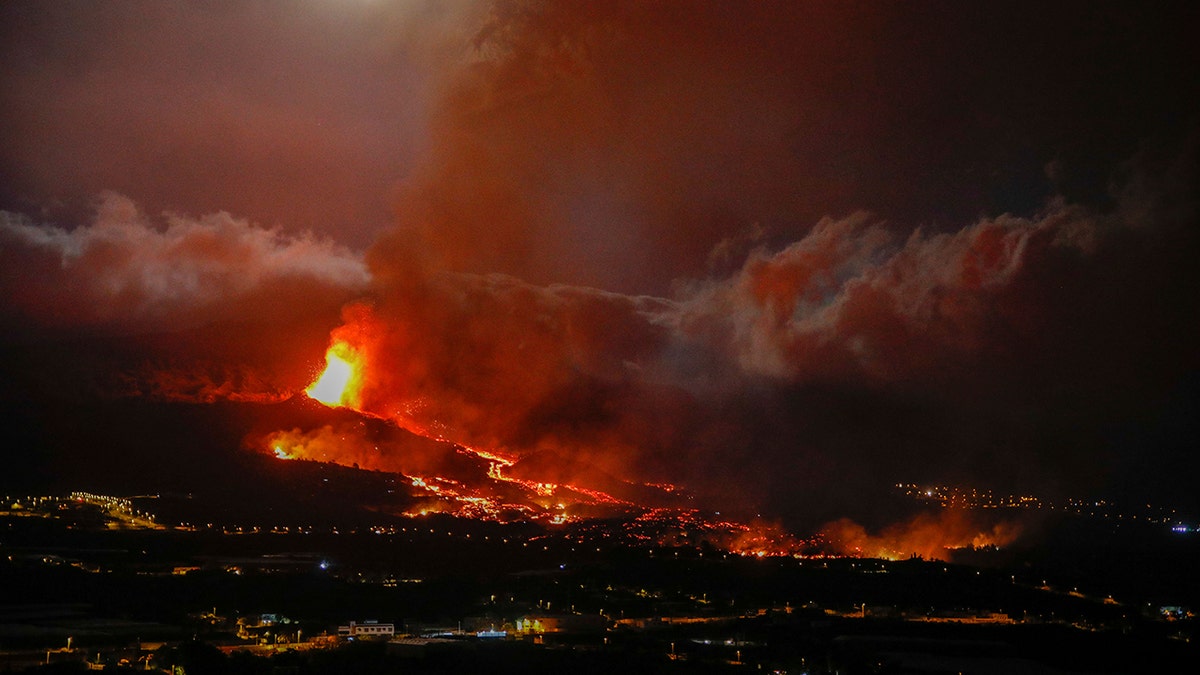 Lava erupts from a volcano near El Paso on the island of La Palma in the Canaries, Spain, Monday Sept. 20.