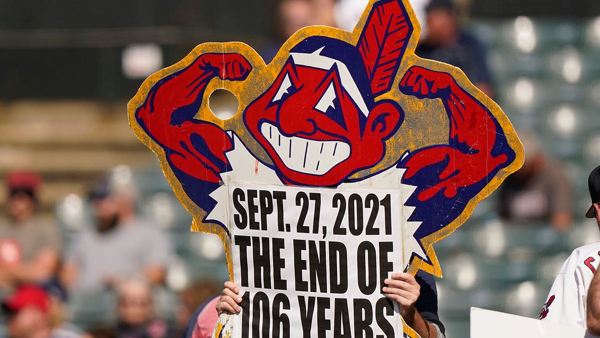 A Cleveland Indians fan holds up a sign during a baseball game between the Kansas City Royals and the Cleveland Indians on Monday, Sept. 27, 2021 in Cleveland.