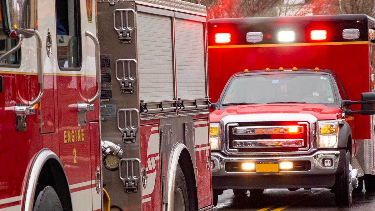 A pair of emergency vehicles responding to a call