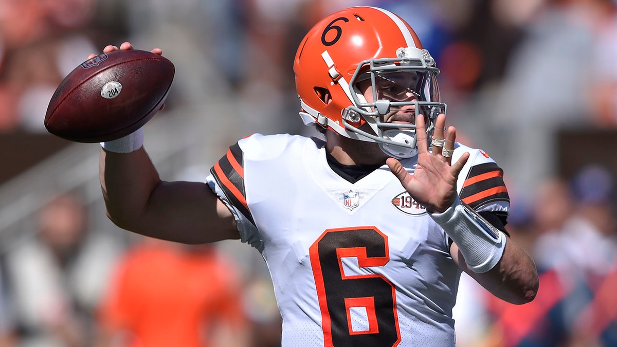 Cleveland Browns quarterback Baker Mayfield throws during the first half of an NFL football game against the Chicago Bears, Sunday, Sept. 26, 2021, in Cleveland.