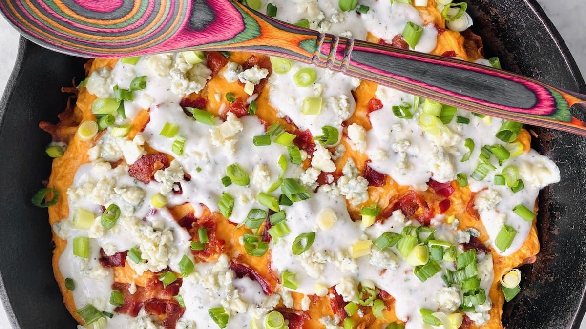 The recipe combines the tangy taste of buffalo chicken dip with crispy tater tots, two "favorite football party foods," according to Morgan’s blog post.