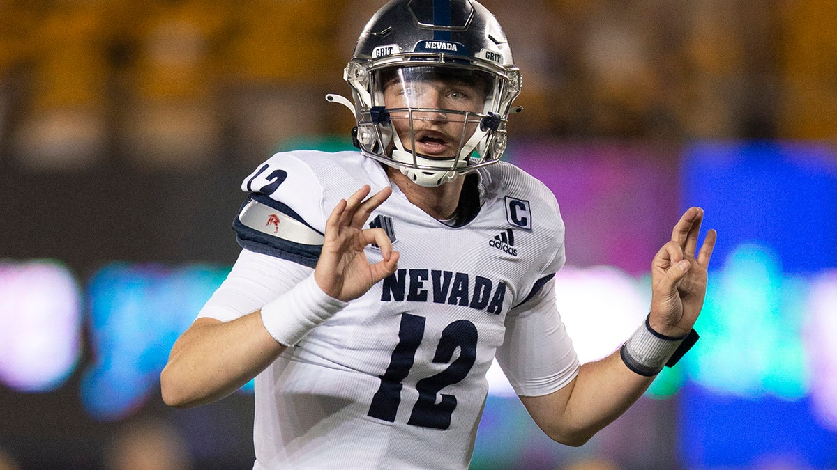 Nevada quarterback Carson Strong calls signals to teammates during the second quarter of an NCAA college football game against California, Saturday, Sept. 4, 2021, in Berkeley, Calif.