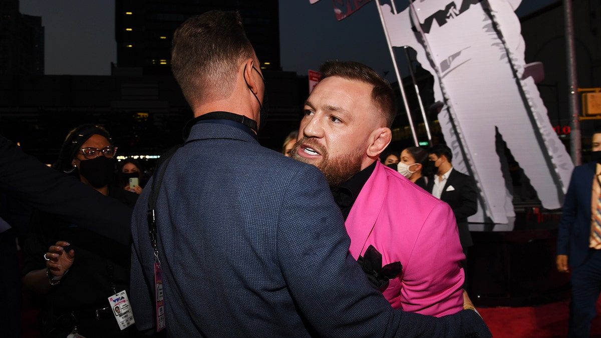 Conor McGregor (R) attends the 2021 MTV Video Music Awards at Barclays Center on Sept. 12, 2021, in the Brooklyn borough of New York City. (Photo by Kevin Mazur/MTV VMAs 2021/Getty Images for MTV/ ViacomCBS)