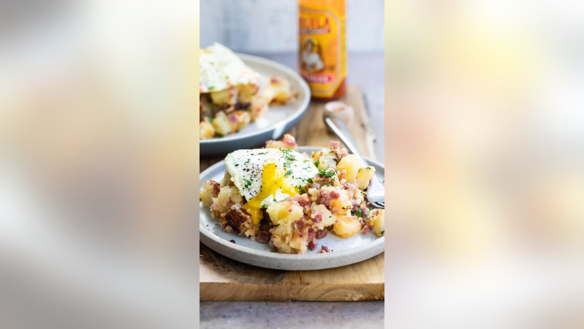 Hill recommends enjoyed corned beef hash topped with an egg with a runny yolk.