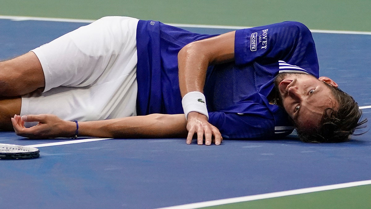Daniil Medvedev, of Russia, reacts after defeating Novak Djokovic, of Serbia, in the men's singles final of the US Open tennis championships, Sunday, Sept. 12, 2021, in New York. (AP Photo/Elise Amendola)
