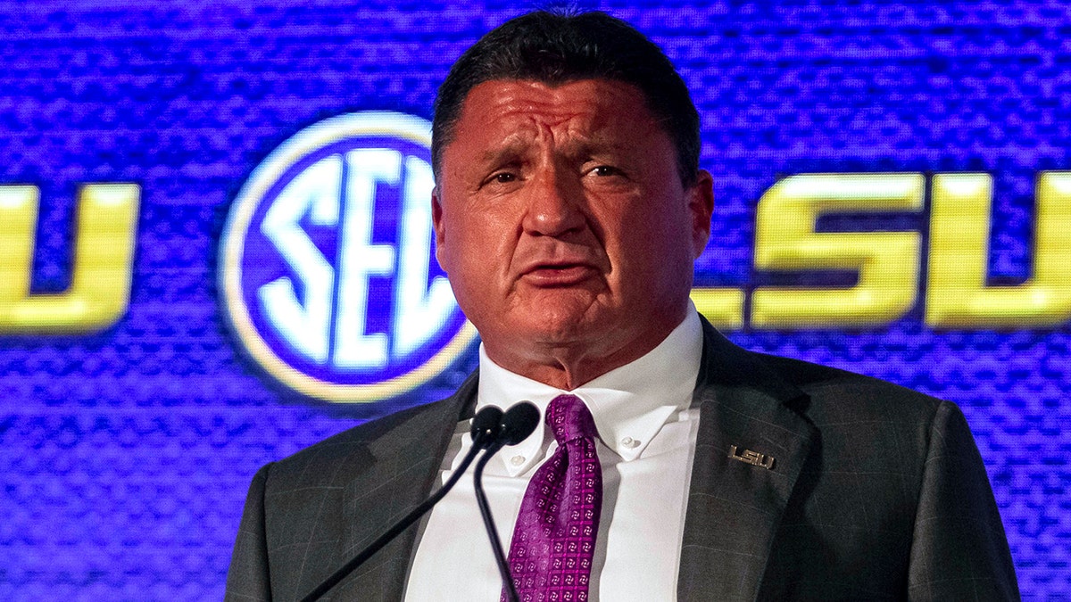 orgeron blue shirt