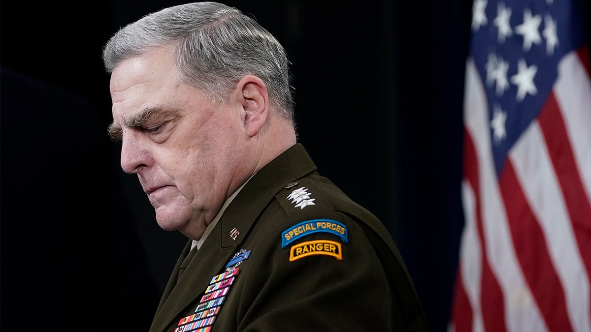Joint Chiefs of Staff Gen. Mark Milley listens during a briefing with Secretary of Defense Lloyd Austin at the Pentagon in Washington, Wednesday, Sept. 1, 2021, about the end of the war in Afghanistan.