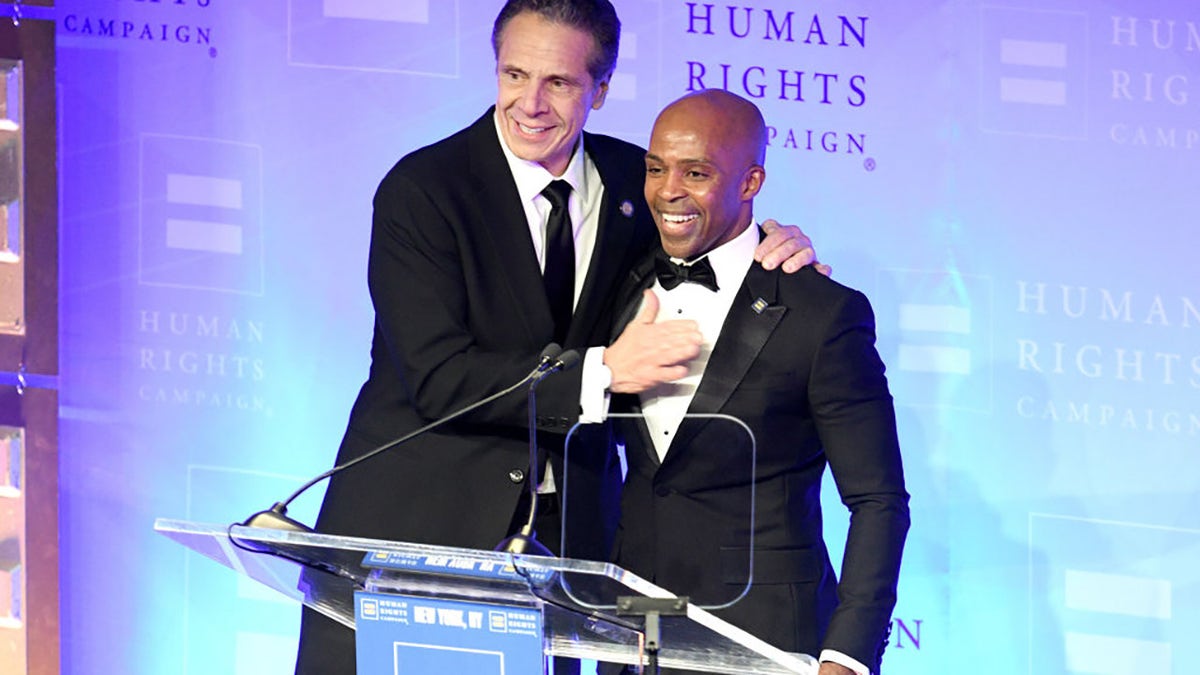 Former New York Gov. Andrew Cuomo is welcomed to the stage by former HRC President Alphonso David during the Human Rights Campaign's 19th Annual Greater New York Gala at the Marriott Marquis Hotel on Feb. 1, 2020, in New York City.