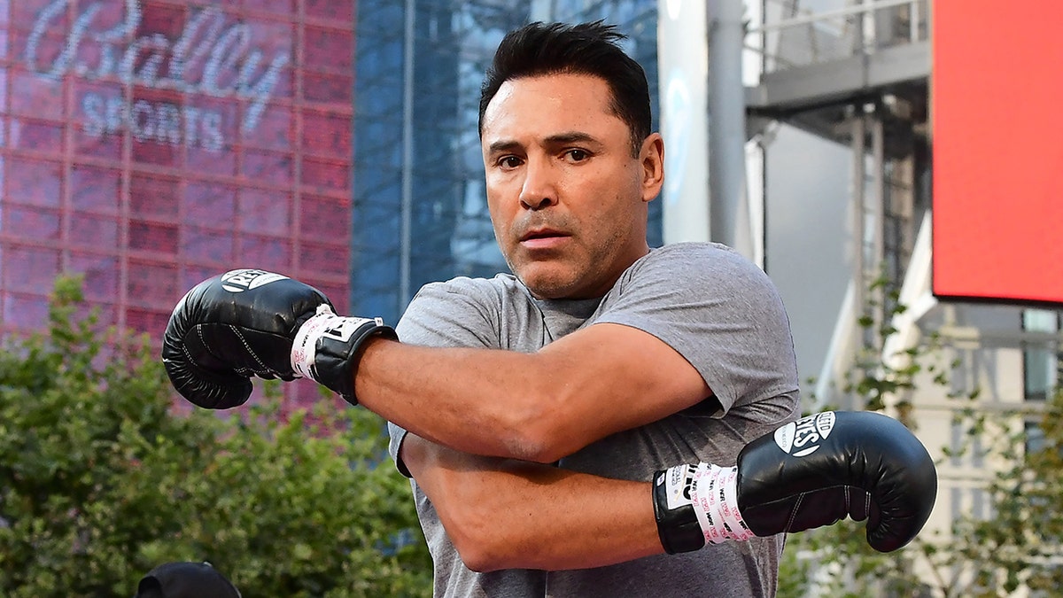 Former US Olympics Gold medalist professional boxer Oscar De La Hoya stretches before sparring with his partner during a media workout in Los Angeles, California on August 24, 2021. (Photo by Frederic J. BROWN / AFP) (Photo by FREDERIC J. BROWN/AFP via Getty Images)