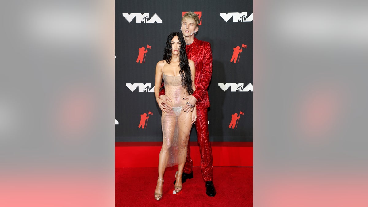 Megan Fox and Machine Gun Kelly step out in sheer style at the MTV VMAs.