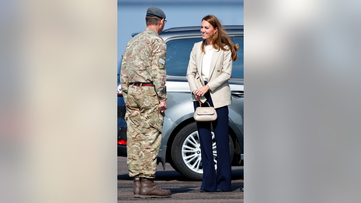 Catherine, Duchess of Cambridge, meets those who supported the U.K.'s evacuation of civilians from Afghanistan during a visit to RAF Brize Norton on Sept. 15 in Brize Norton, England.