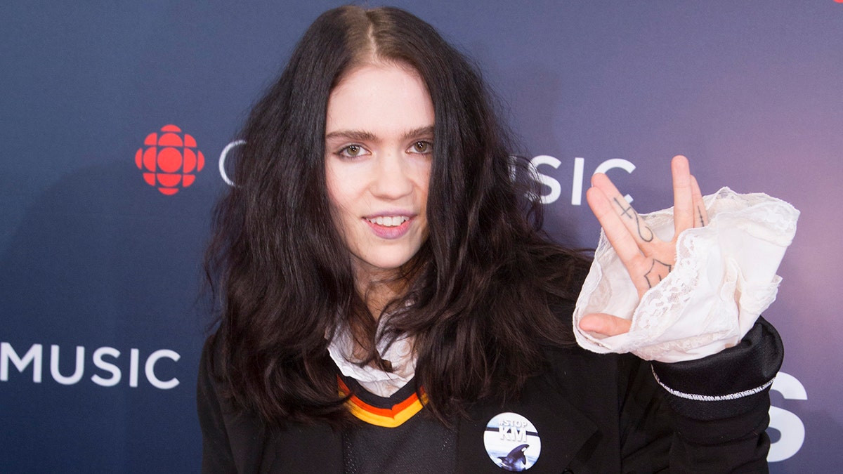 Grimes on red carpet