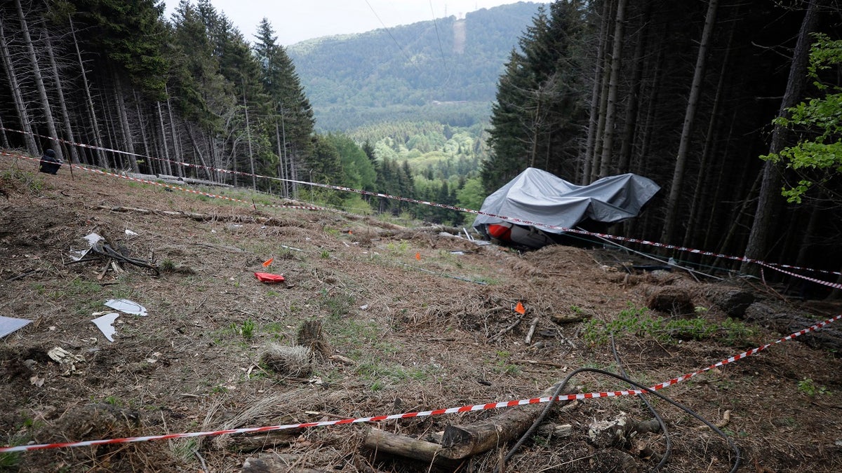 The wreckage of a cable car after it collapsed near the summit of the Stresa-Mottarone line in the Piedmont region, northern Italy, is seen on May 26.