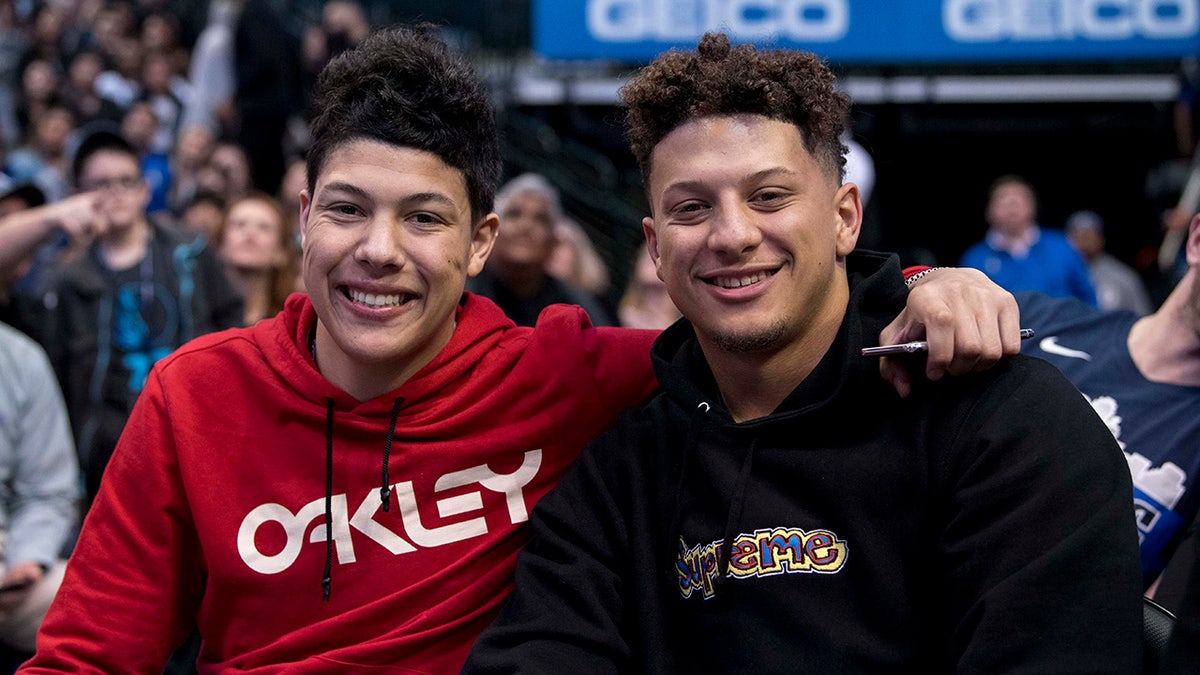 Kansas City Chiefs quarterback Patrick Mahomes (right) watches the game between the Dallas Mavericks and the Houston Rockets with his brother Jackson Mahomes (left) at the American Airlines Center March 10, 2019, in Dallas.