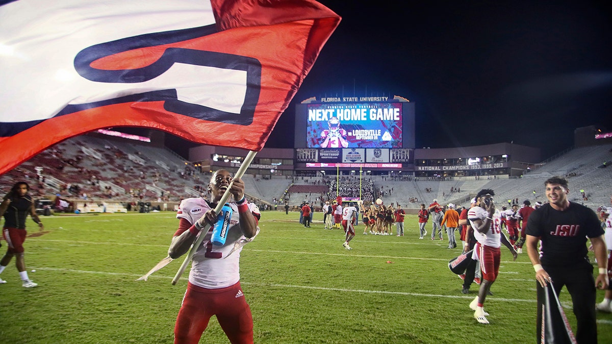 Jacksonville State wide receiver Michael Pettway (2) waves a flag on the field after the team's 20-17 win over Florida State in an NCAA college football game Saturday, Sept. 11, 2021, in Tallahassee, Fla. (AP Photo/Phil Sears)