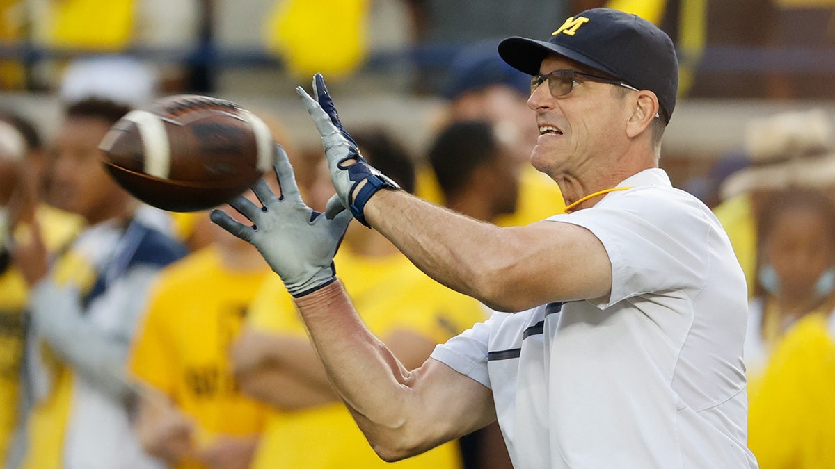 Sep 11, 2021; Ann Arbor, Michigan, USA; Michigan Wolverines head coach Jim Harbaugh during warm ups against the Washington Huskies at Michigan Stadium.