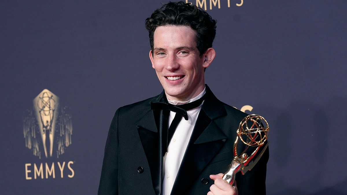 Josh O'Connor, winner of the award for outstanding lead actor in a drama series for "The Crown" poses at the 73rd Primetime Emmy Awards on Sunday, Sept. 19, 2021, at L.A. Live in Los Angeles. 