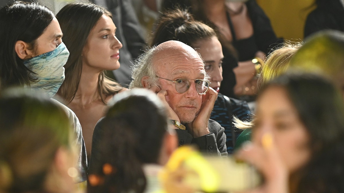 The music during the fashion Shows at Terrace at Spring Studios proved too loud for ‘Curb Your Enthusiasm’ star Larry David, who is seen using his fingers to plug his ears.