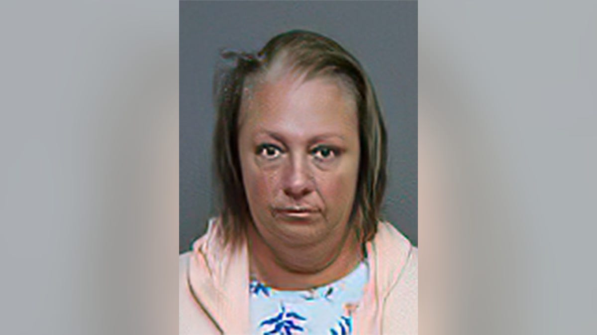 Lori Desjardins, 45, is accused of assaulting and berating a Navy sailor inside a Connecticut pizza shop. 