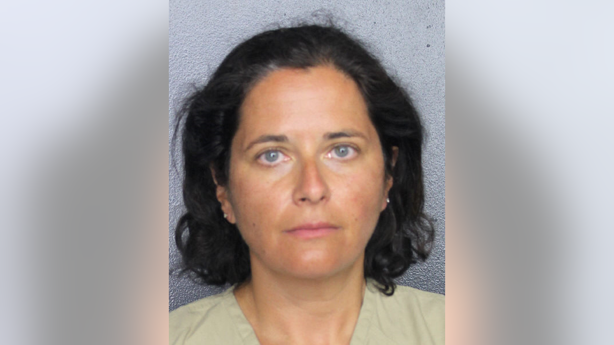 Marina Verbitsky, 46, is accused of telling airport employees a bomb was in her checked luggage after arriving at her gate too late to board the plane. 