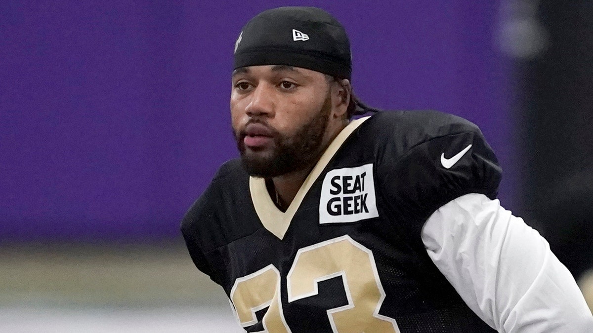 New Orleans Saints cornerback Marshon Lattimore stretches during football practice at the TCU indoor facility in Fort Worth, Texas, Wednesday, Sept. 8, 2021. 