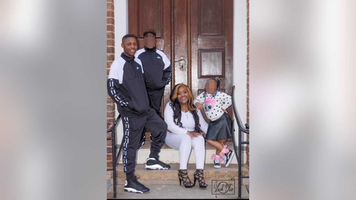 William Chavis Raynard Miller Jr. (far left) and his mother Shannon Clark. The teen was killed in a shooting at Mount Tabor High School in Winston-Salem.