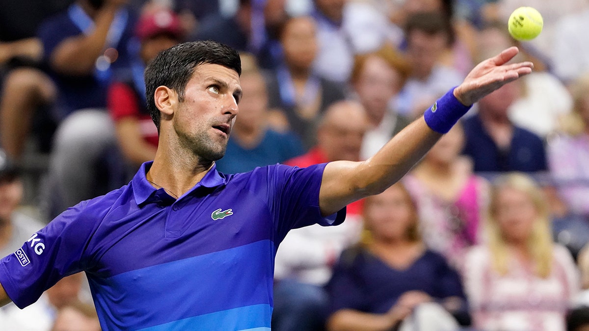 Novak Djokovic, of Serbia, serves against Jenson Brooksby, of the United States, during the fourth round of the U.S. Open tennis championships, Monday, Sept. 6, 2021, in New York. (AP Photo/John Minchillo)