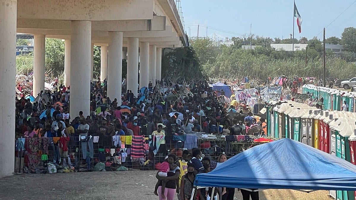 Sept. 18, 2021: Migrants camp under the International Bridge in Del Rio.